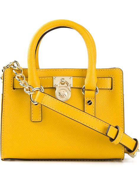 michael kors yellow small wallet|Michael Kors purses clearance yellow.